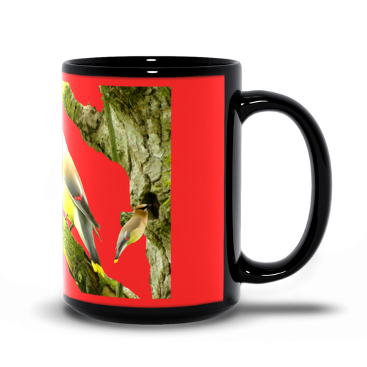 Black mug with a red background featuring cedarwaxwings and tree design