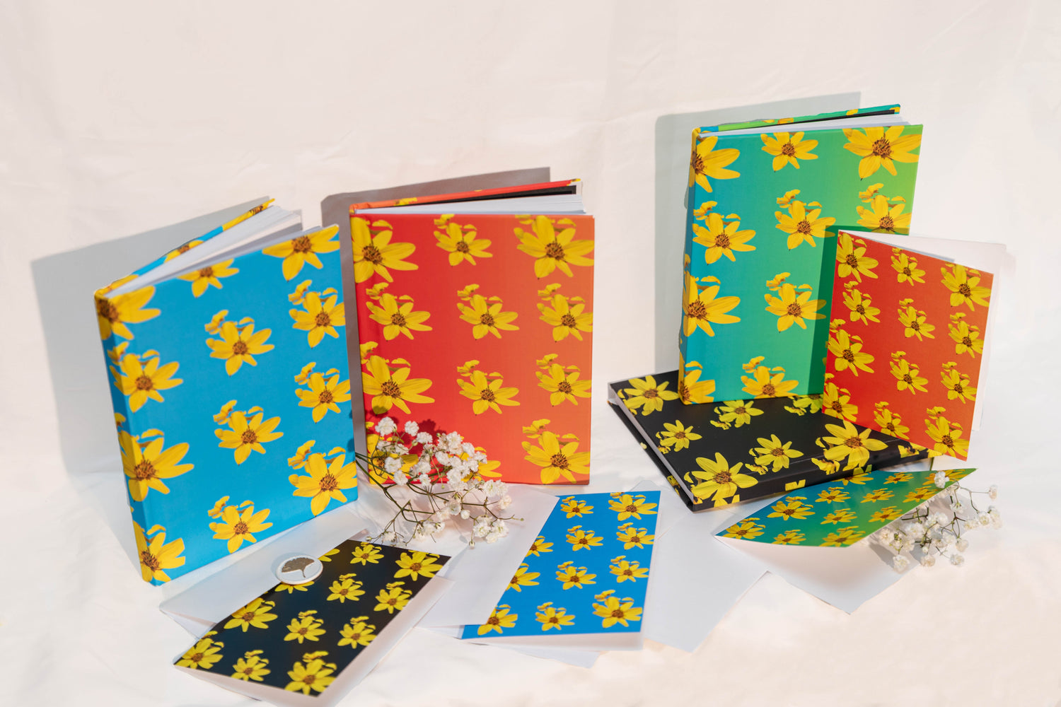 An array of chirp and charm products - journals, mugs, and cards. 