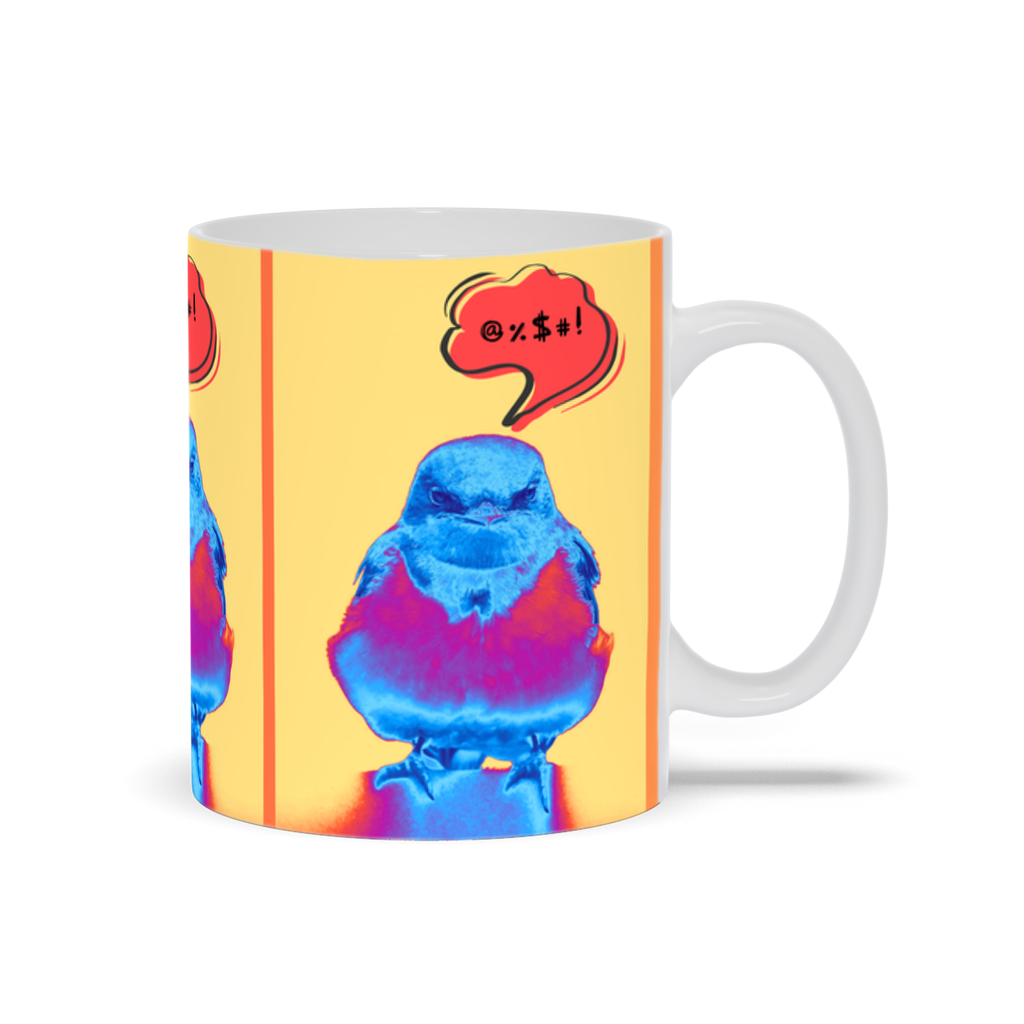 Bright colorful pop art barn swallow with grumpy expression on a yellow background with a speech bubble above indicating swearing on a white mug. 