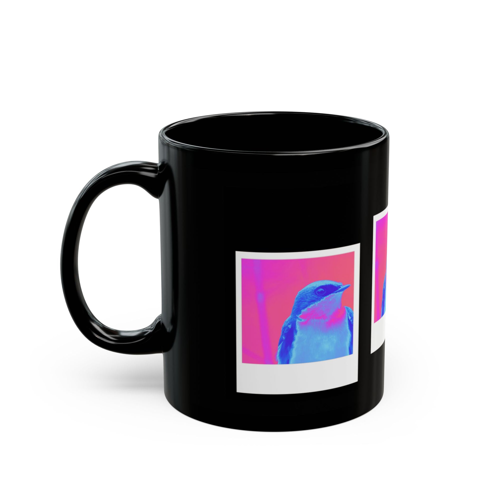 Black mug with a colorful bird design on a white background