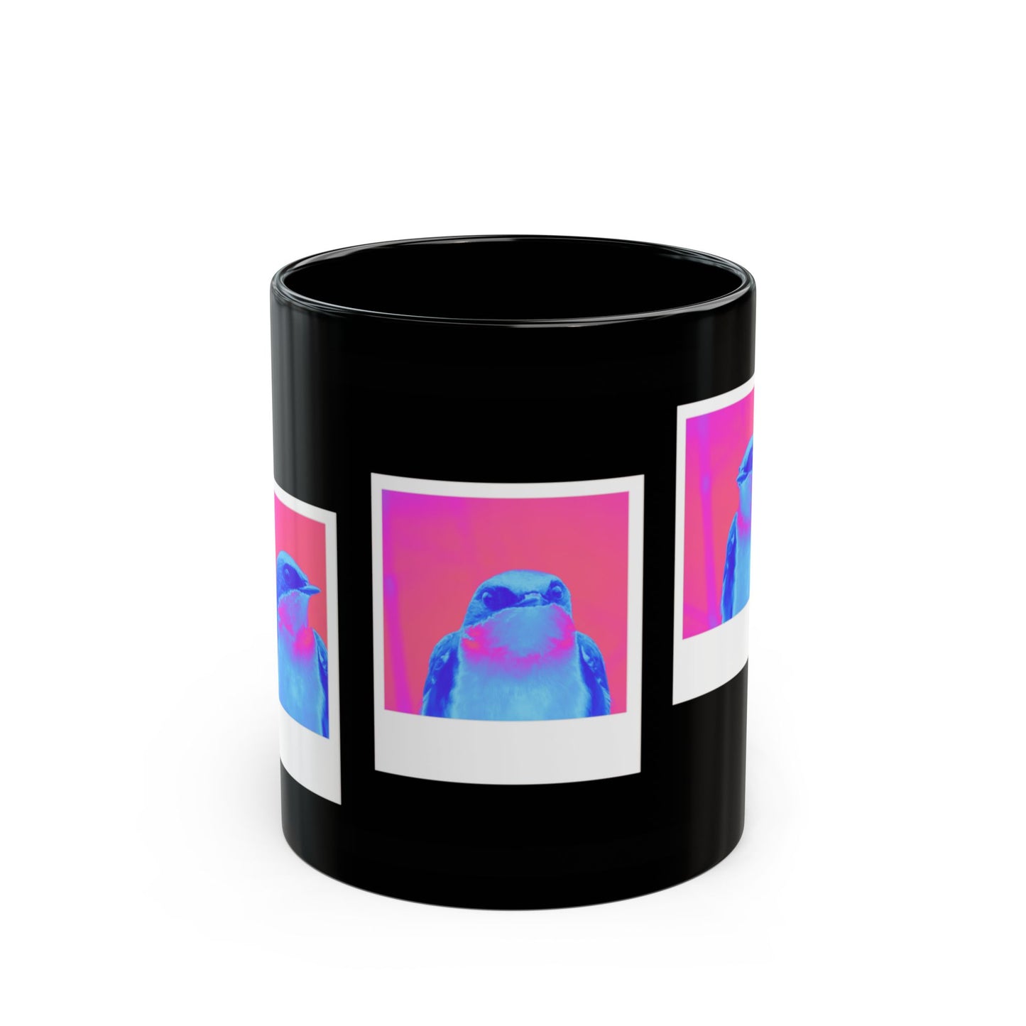 Black mug with colorful bird design on a white background