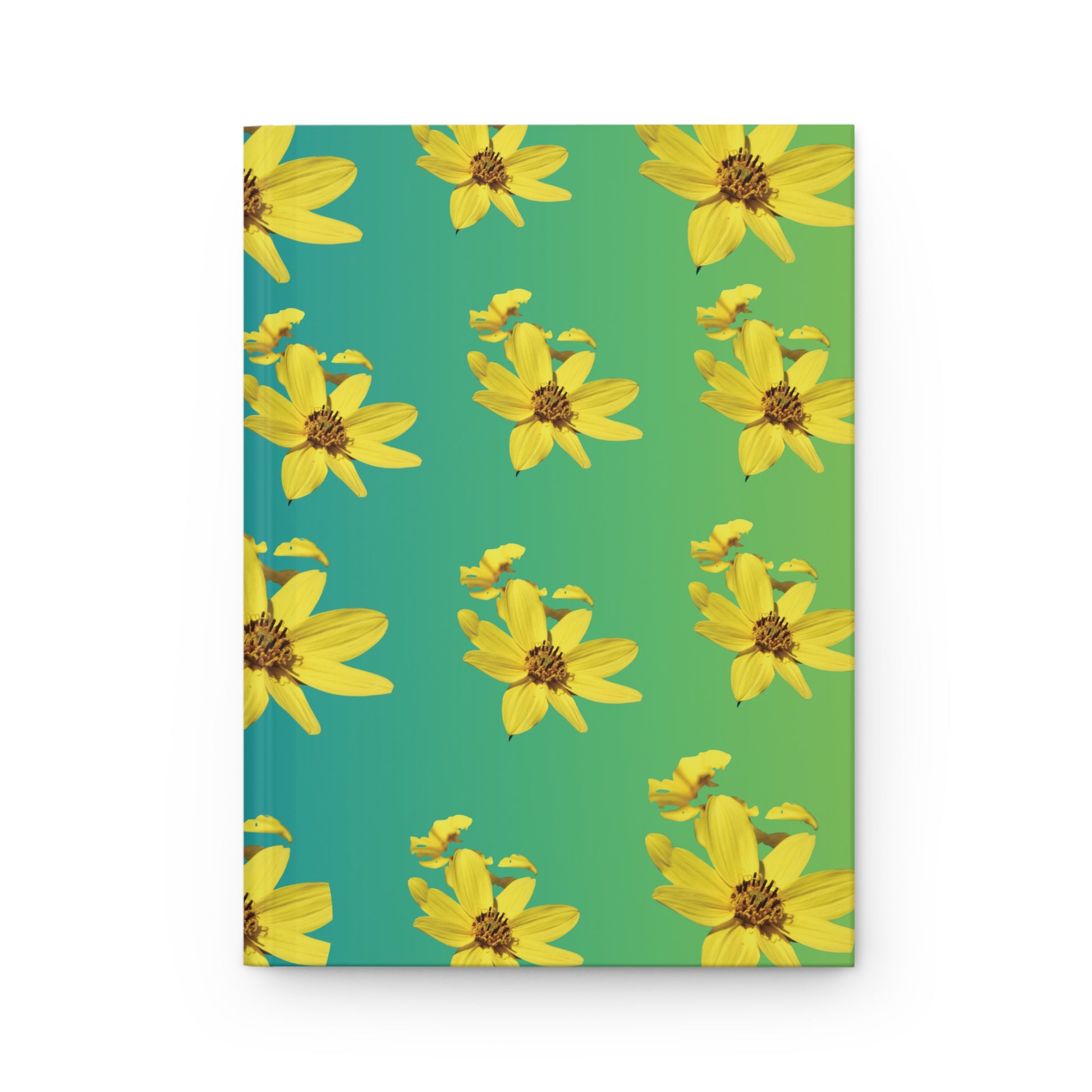 Notebook with yellow floral pattern on a green background
