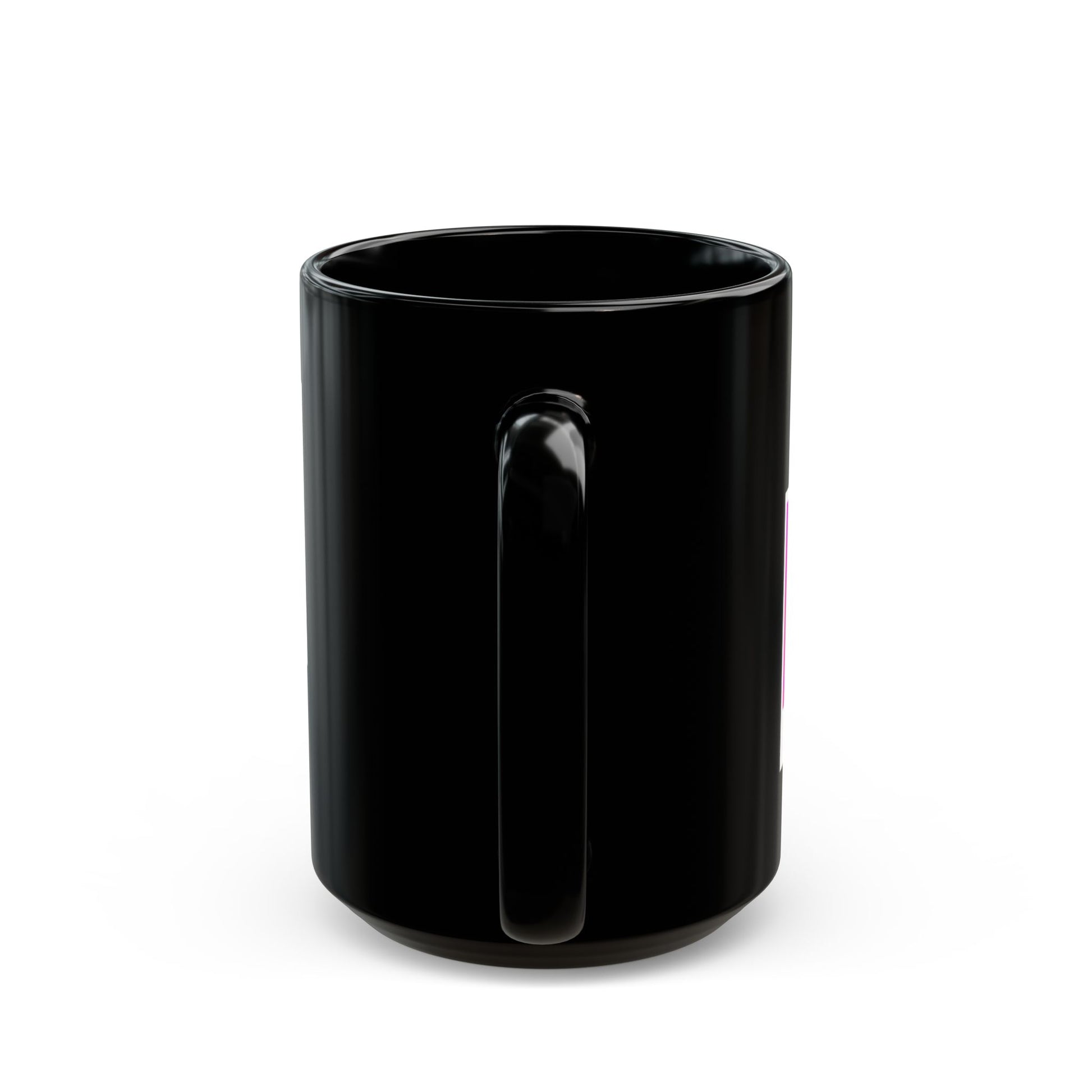 A black mug with the black handle facing the viewer. 