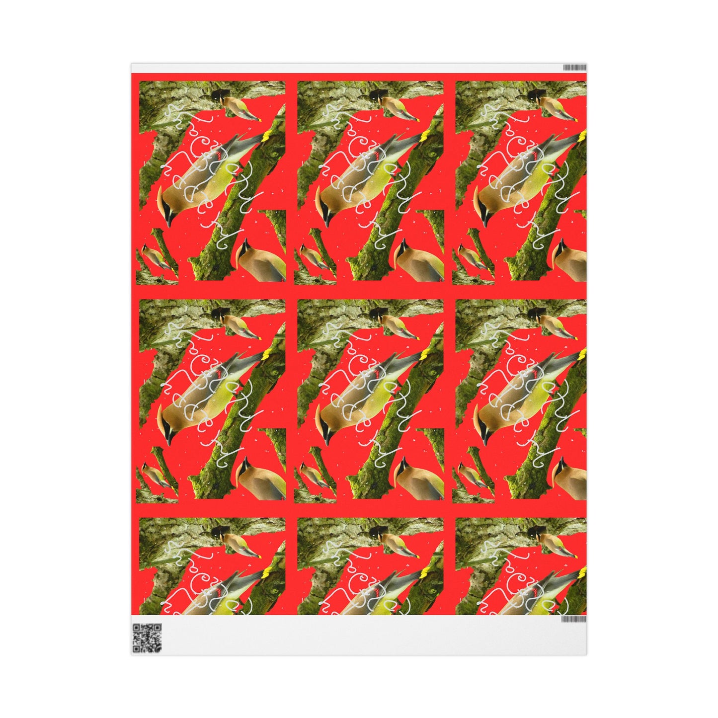 Wrapping paper with a red background featuring cedar waxings on branches with the words happy holidays in white and white speckling representing snow throughout. 