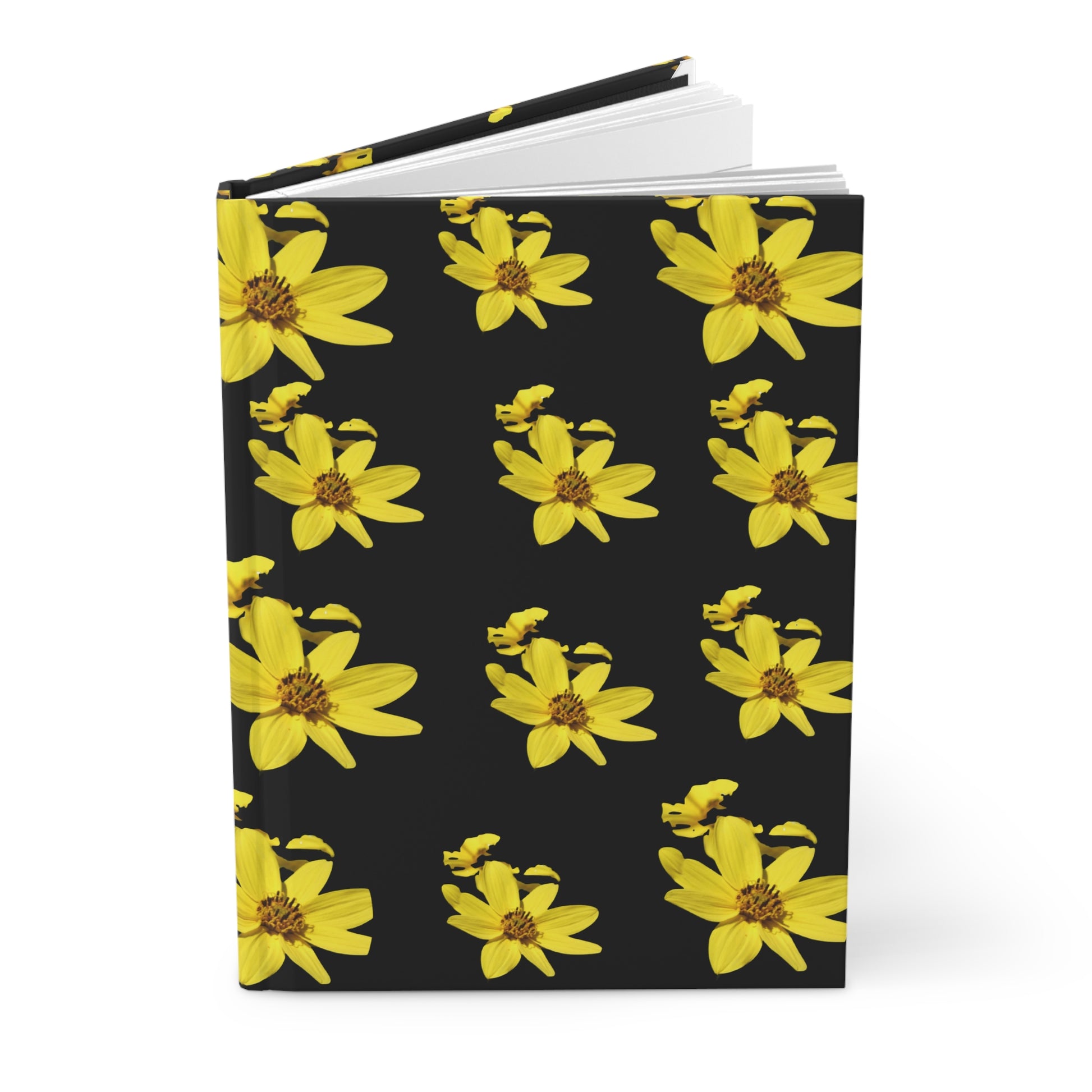 Notebook with yellow flower pattern on a black background