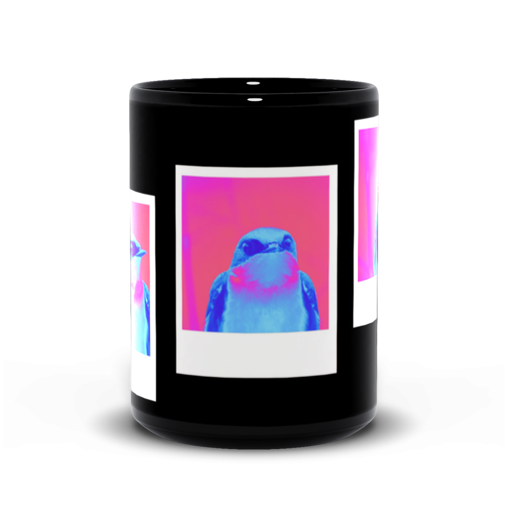 Black mug with a colorful bird design on a white background
