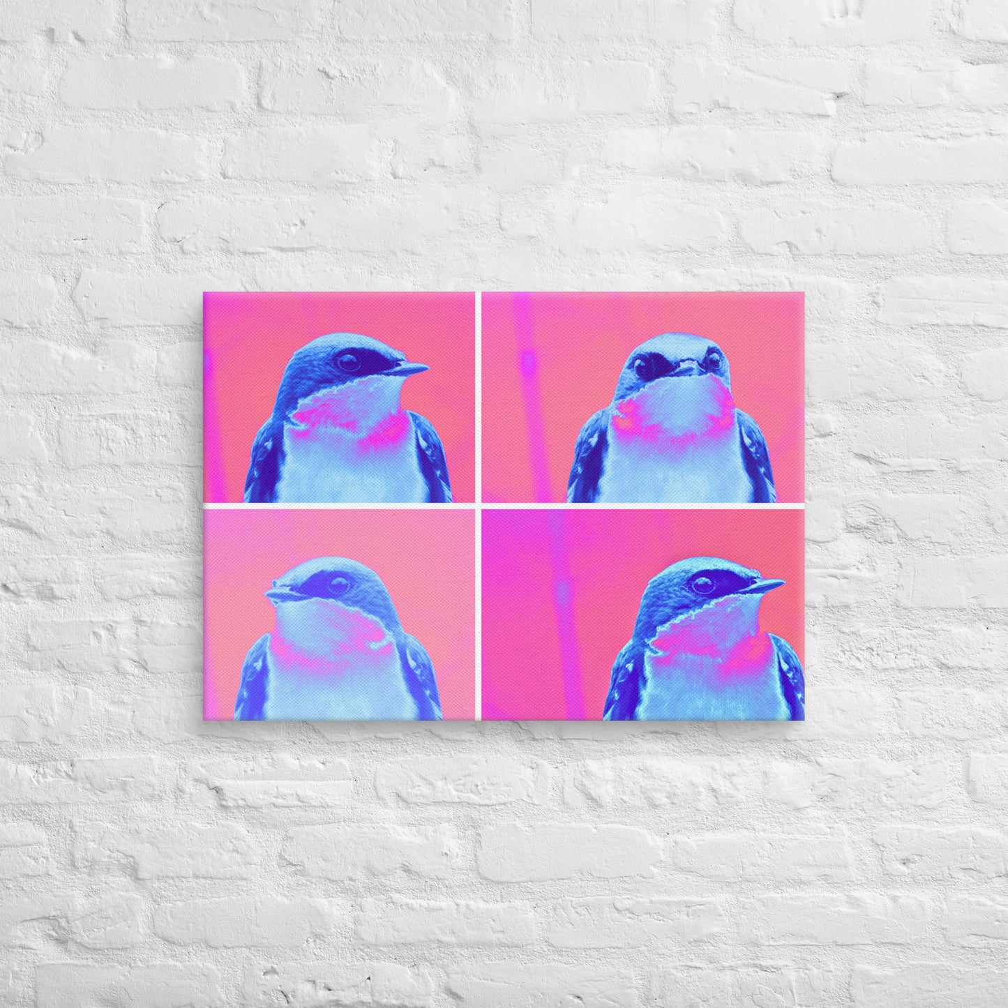 A canvas wrap with four images of a blue bird with a pink background in a pop art style on a white textured wall.