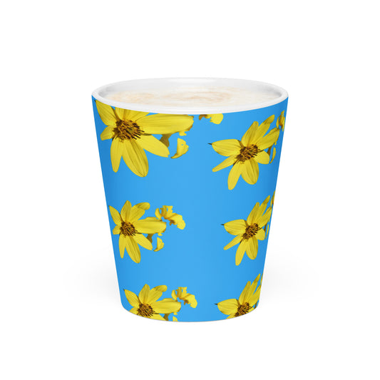 Blue mug with yellow floral pattern on a white background
