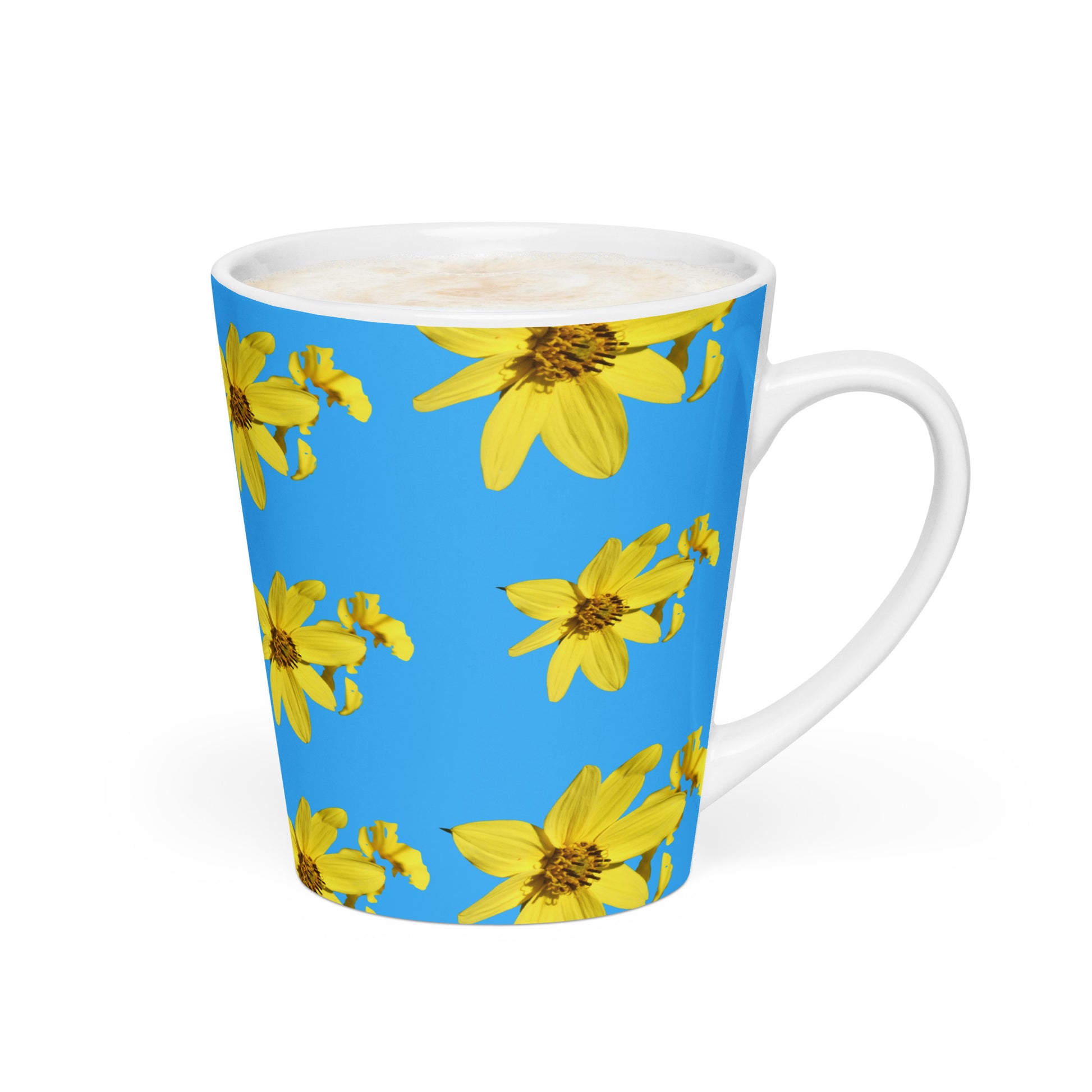 Blue mug with yellow floral pattern and a white handle on a white background