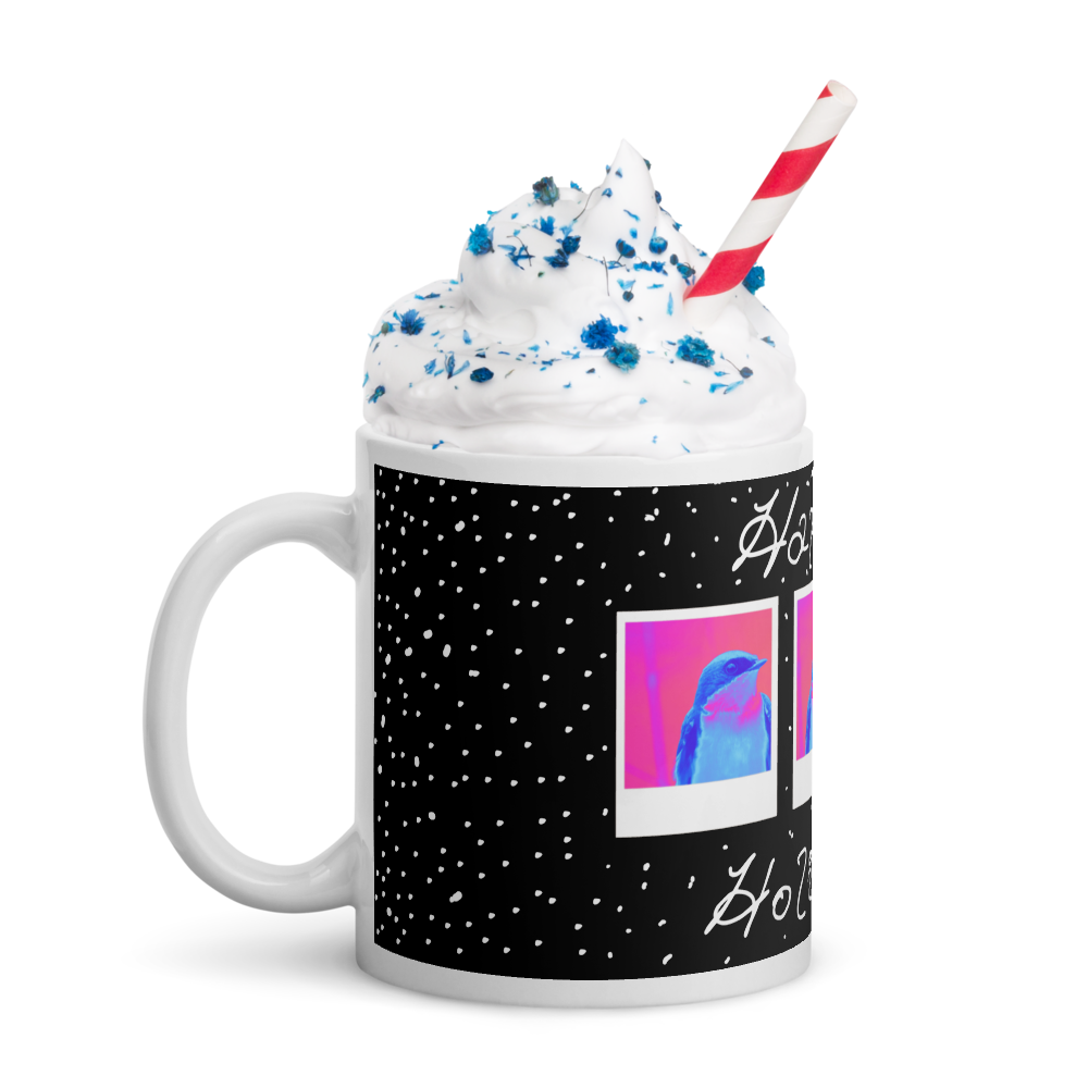Mug with a festive winter holiday design resembling with whipped cream and a straw. 